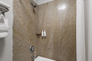 Room, 2 Queen Beds, Non Smoking | Bathroom | Combined shower/tub, free toiletries, hair dryer, towels