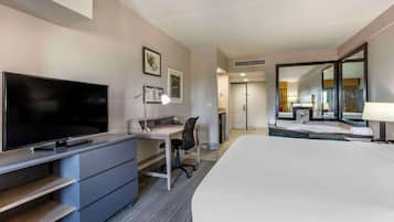 Suite, 1 King Bed, Non Smoking, Balcony | Hypo-allergenic bedding, in-room safe, desk, blackout drapes