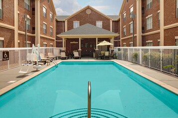 Seasonal outdoor pool, pool loungers