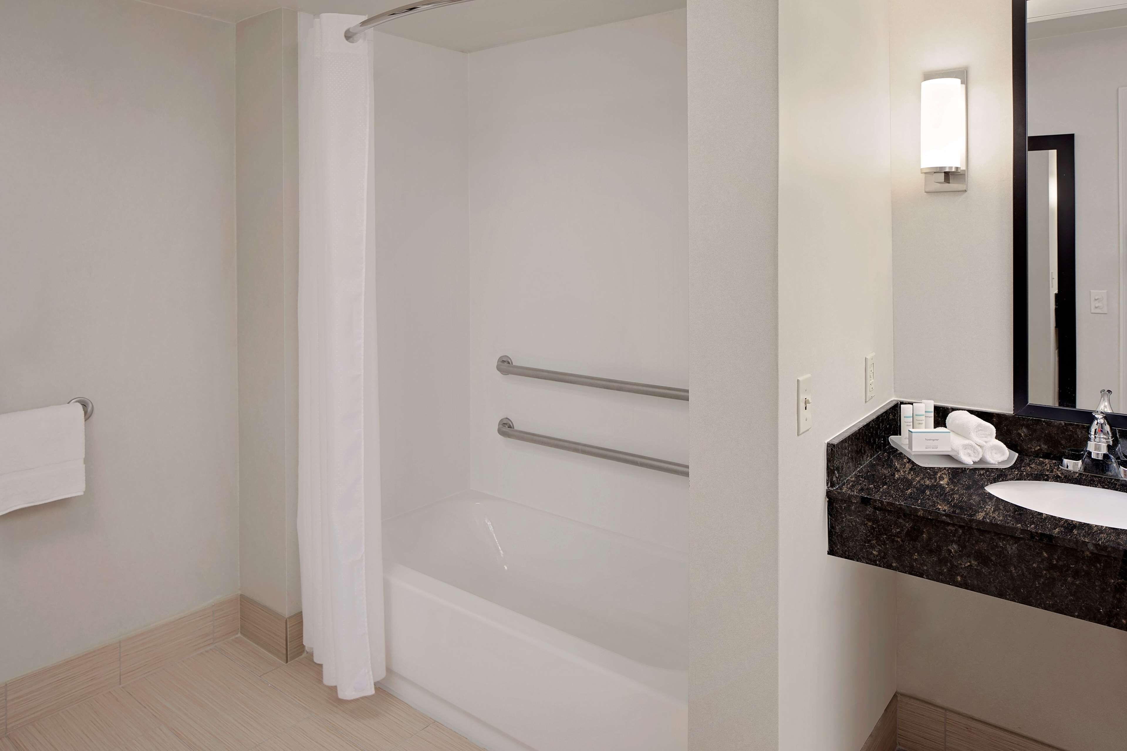 hair dryer, towels, soap, shampoo