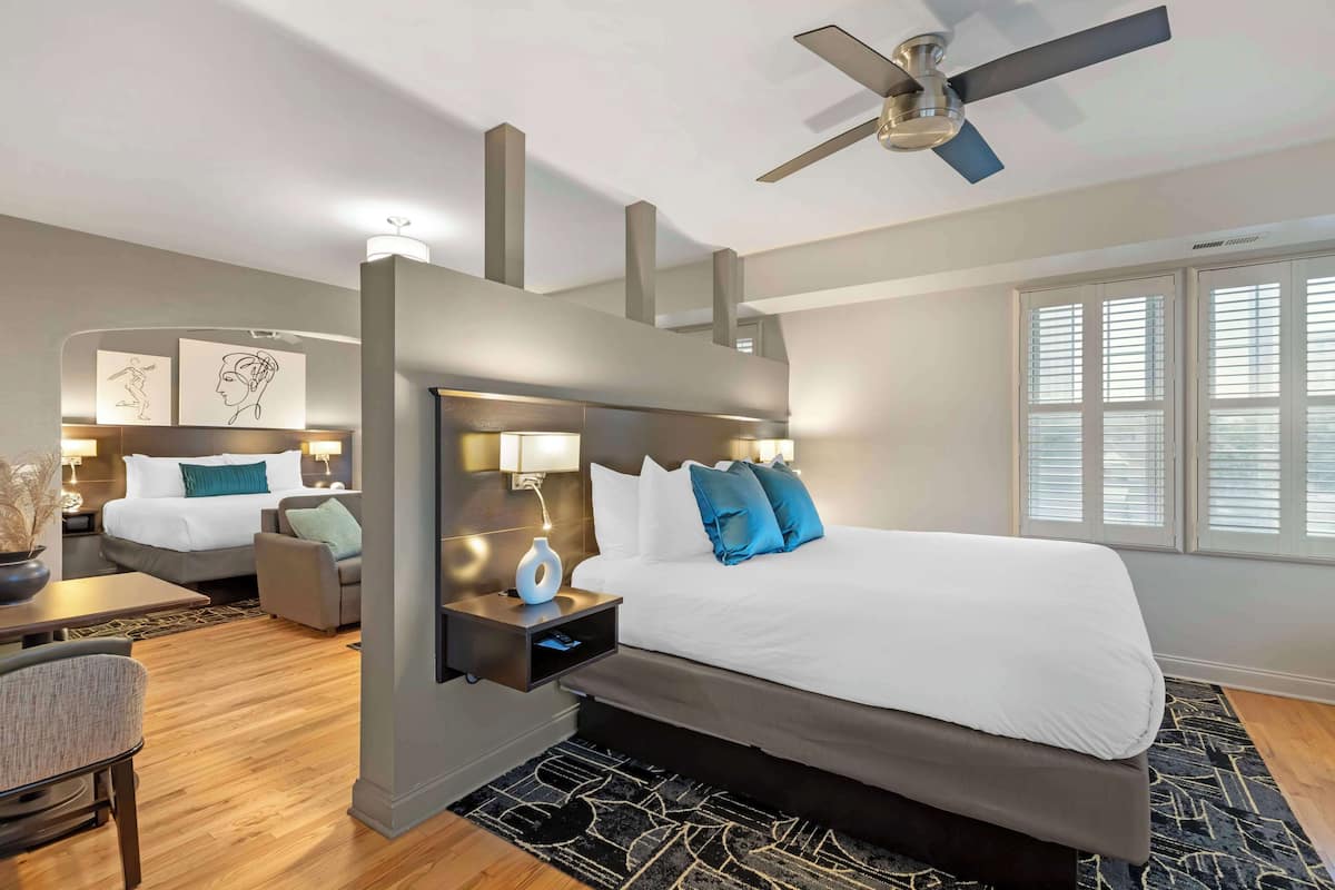 Suite, Multiple Beds, Kitchenette, Annex Building (Shower Only;with Single Sofabed) | In-room safe, desk, laptop workspace, iron/ironing board