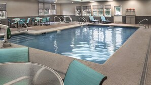 An indoor swimming pool with lounge chairs and tables, surrounded by windows and a ceiling mural. - Residence Inn Cranberry Township Pittsburgh by Marriott (Warrendale)
