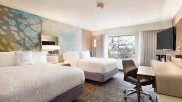 Premium bedding, down duvets, pillow-top beds, in-room safe