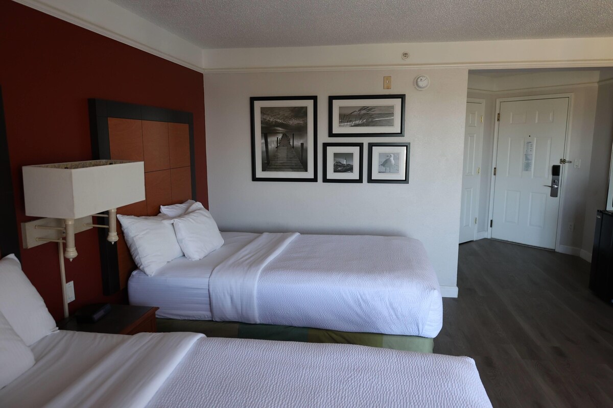 Premium bedding, down comforters, desk, blackout drapes