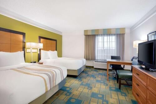 Premium bedding, down comforters, desk, blackout drapes