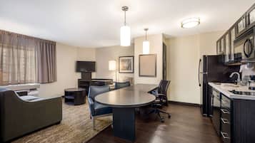 Hypo-allergenic bedding, desk, laptop workspace, blackout curtains