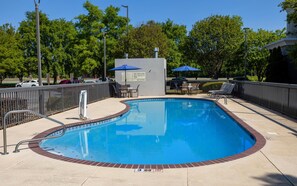 Outdoor pool, open 6 AM to 10 PM, pool umbrellas, sun loungers