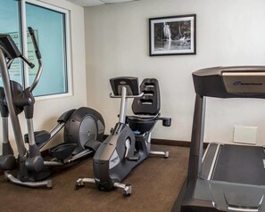 A gym with stationary bikes, an elliptical, and a treadmill. - Sleep Inn Historic Williamsburg (Williamsburg)