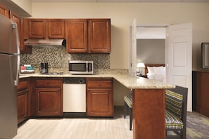 Full-size fridge, microwave, stovetop, coffee/tea maker