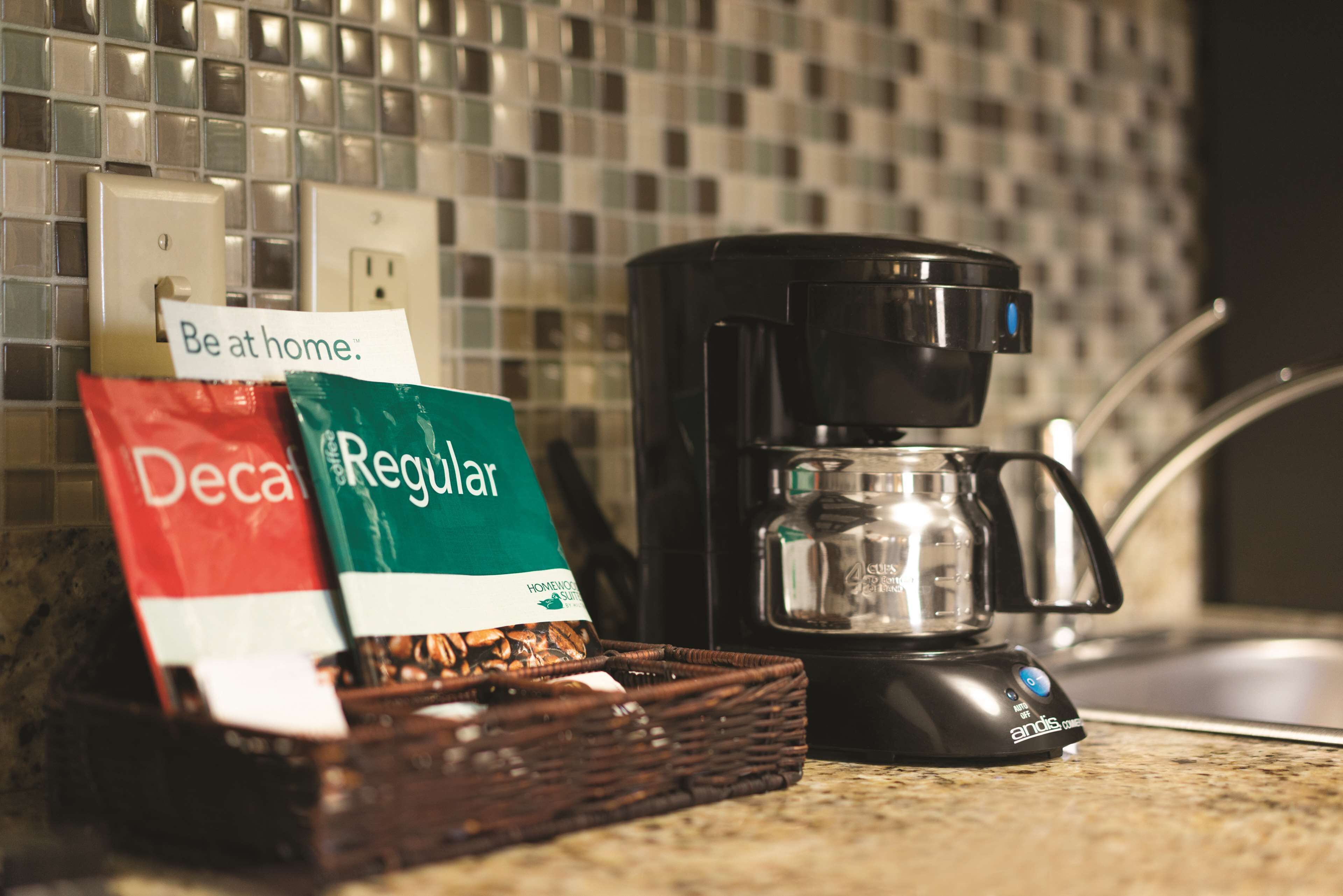 full-sized fridge, microwave, stovetop, coffee/tea maker