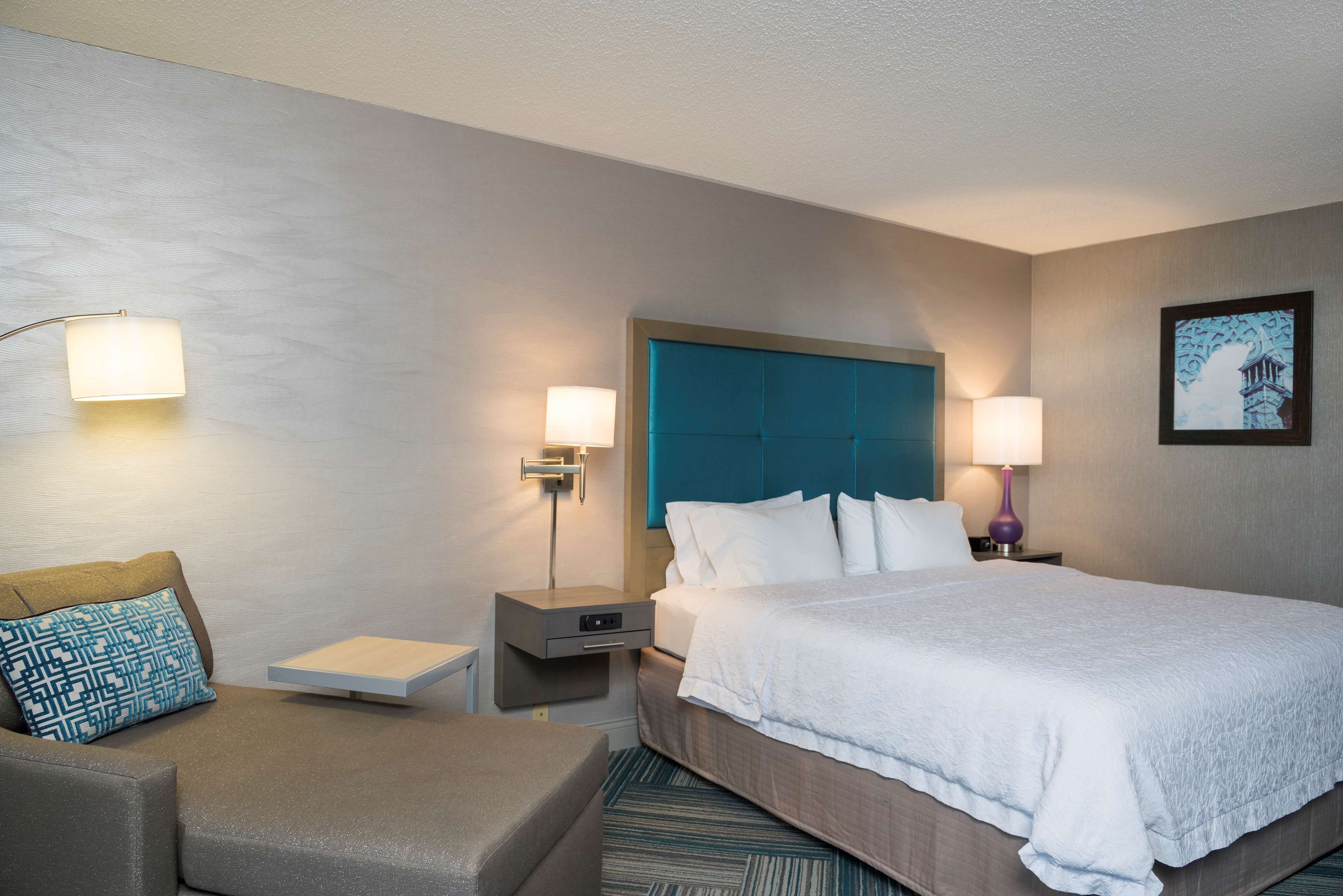 premium bedding, desk, blackout curtains, iron/ironing board