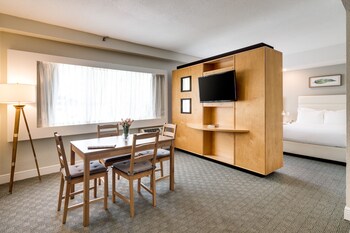 Laptop workspace, iron/ironing board, free internet, bed sheets at Crest Hotel Suites
