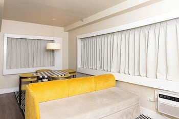 Suite, 1 Bedroom, Accessible, Kitchenette | Laptop workspace, iron/ironing board, free internet, bed sheets at Crest Hotel Suites