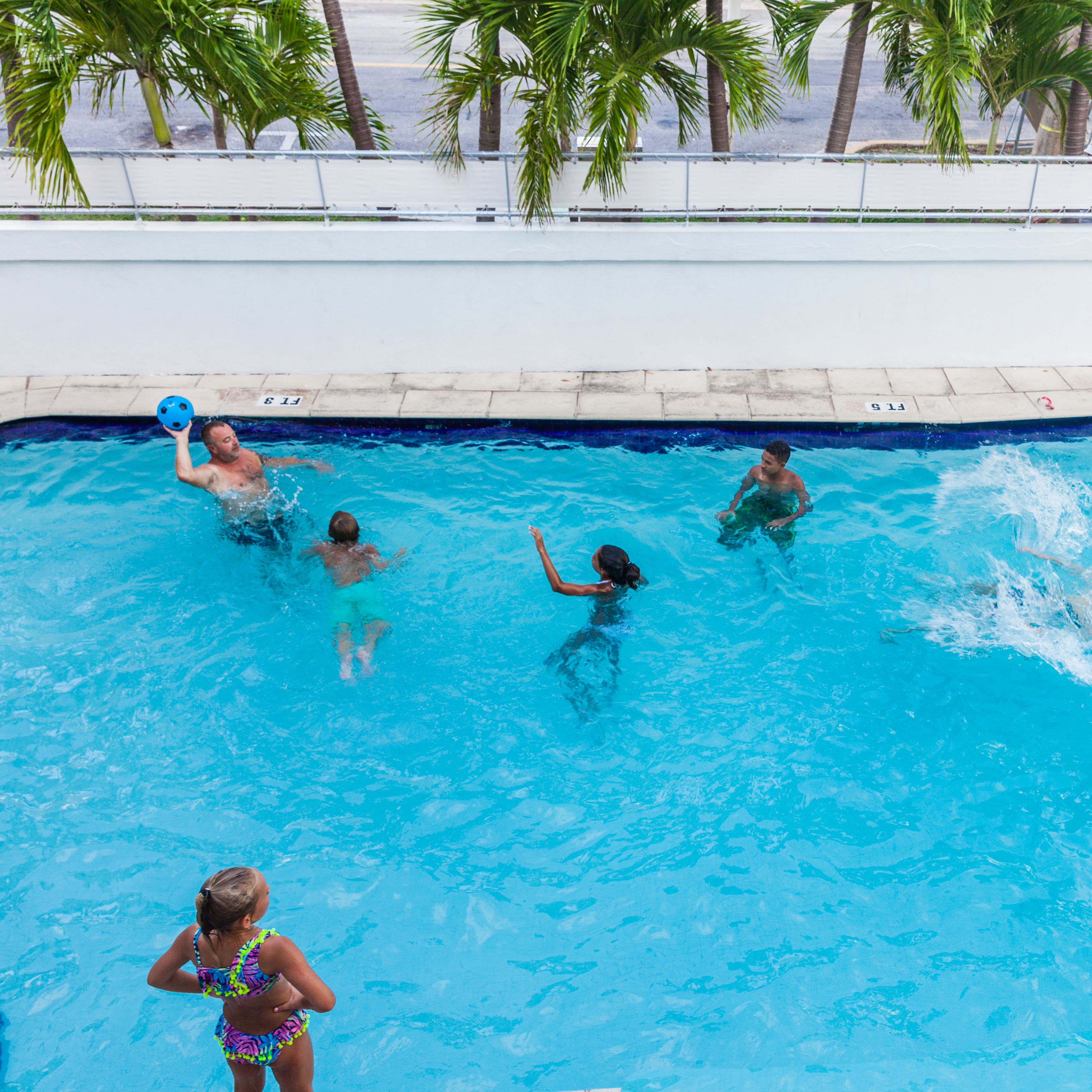 Outdoor pool, open 9:00 AM to 5:00 PM, pool umbrellas, pool loungers