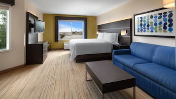 Suite, 1 King Bed | In-room safe, desk, soundproofing, iron/ironing board