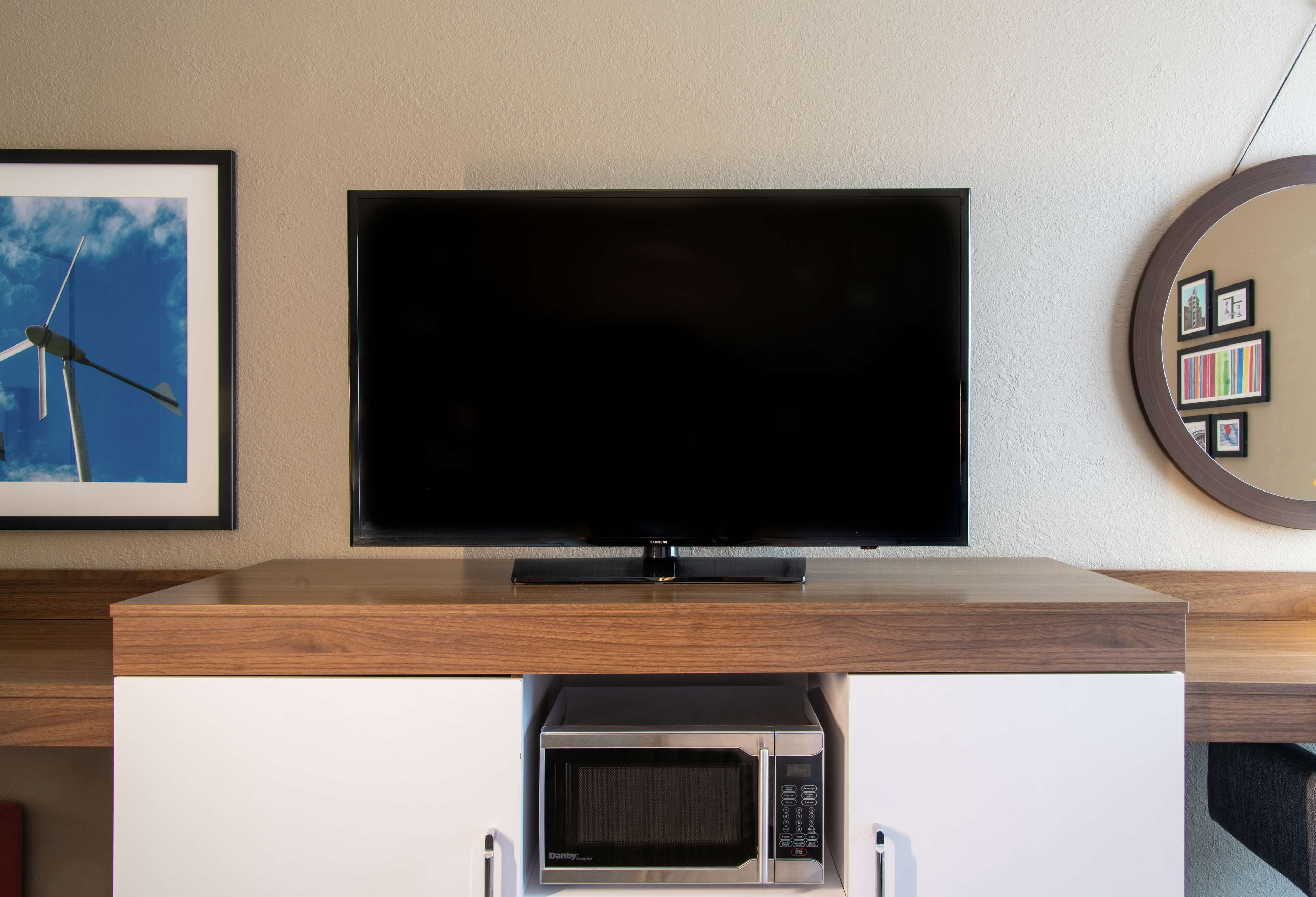 premium bedding, pillow-top beds, desk, laptop workspace