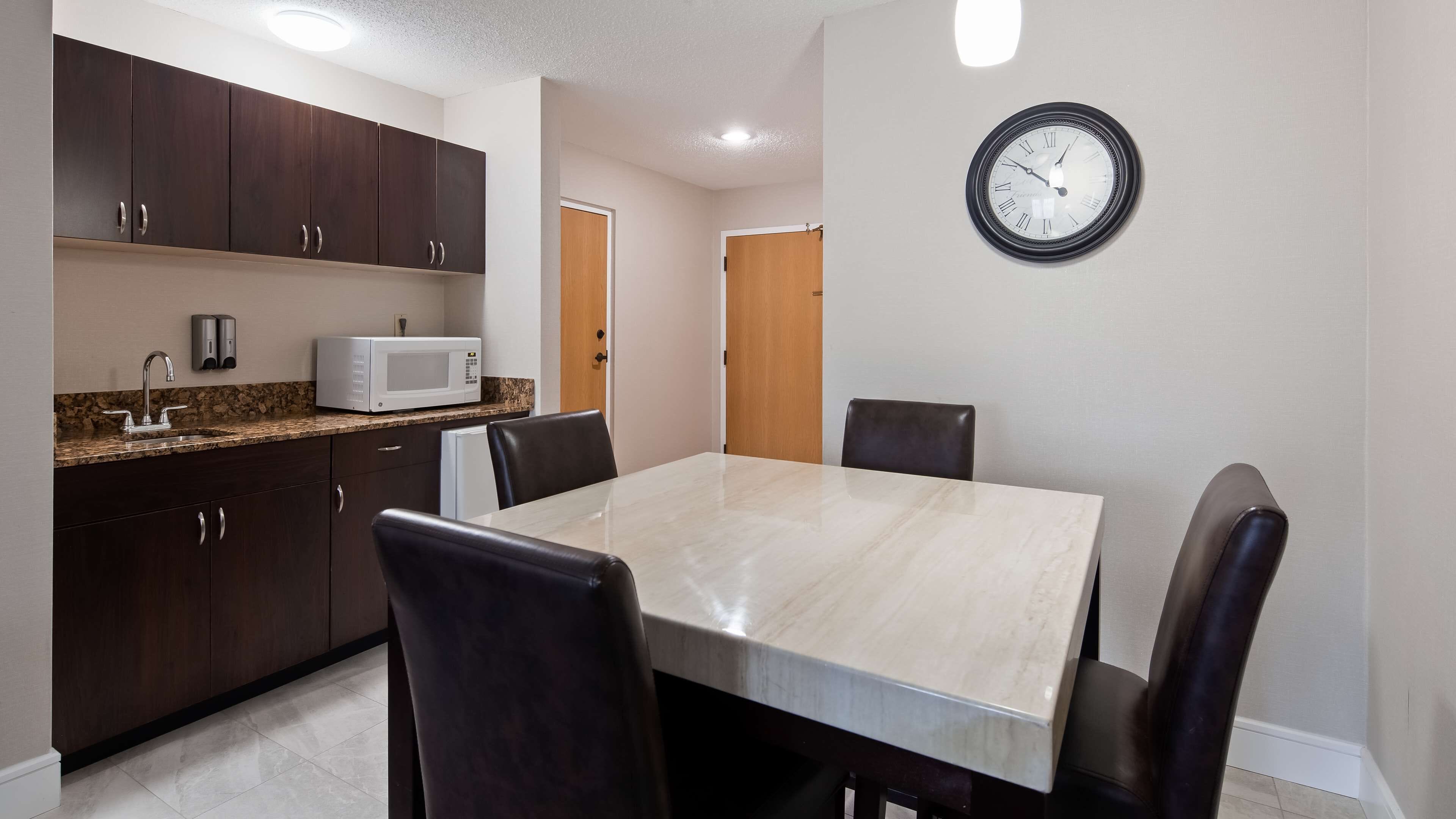 executive suite, 1 king bed, non smoking, refrigerator & microwave | desk, laptop workspace, blackout curtains, iron/ironing board