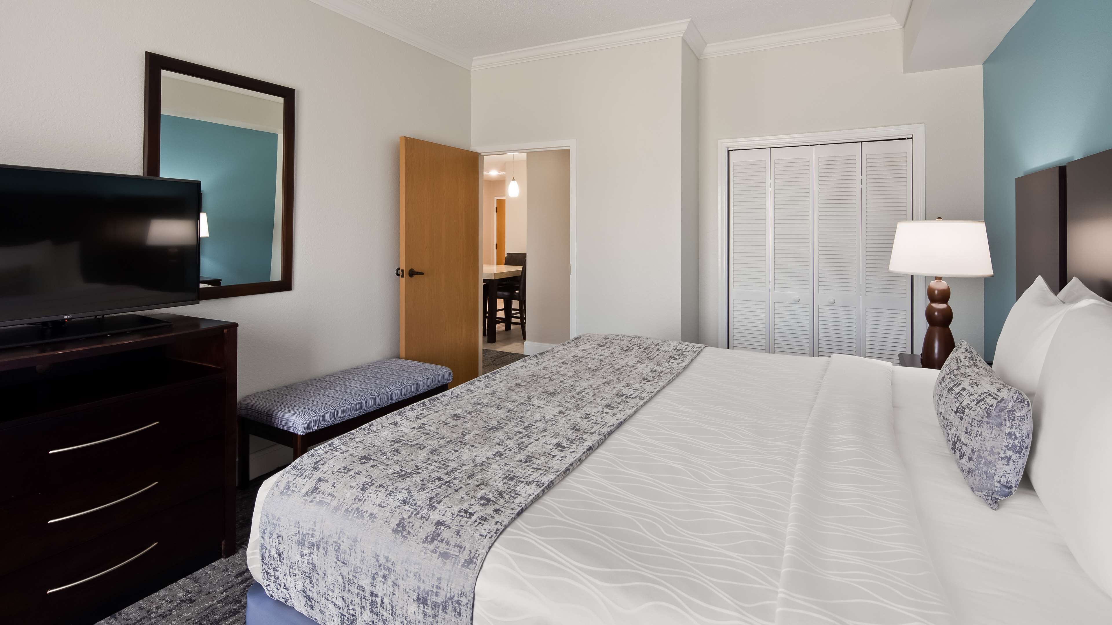 executive suite, 1 king bed, non smoking, refrigerator & microwave | desk, laptop workspace, blackout curtains, iron/ironing board