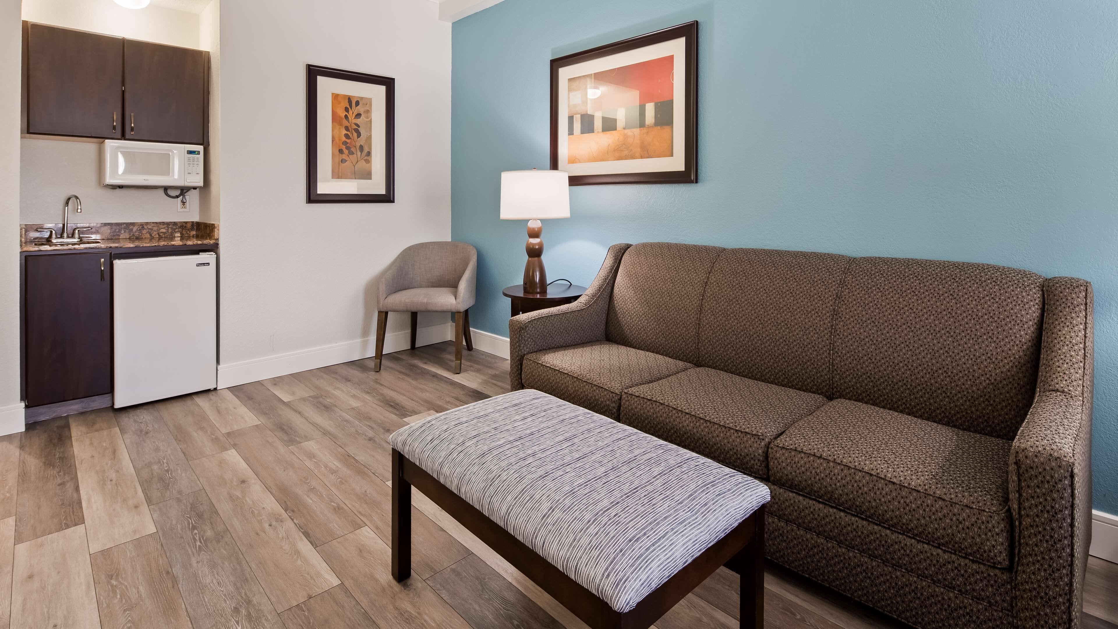 desk, laptop workspace, blackout curtains, iron/ironing board