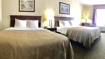 Room, 2 Queen Beds, Non Smoking (Chair with Ottoman) | In-room safe, desk, iron/ironing board, free cribs/infant beds