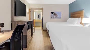 Premium bedding, desk, laptop workspace, iron/ironing board