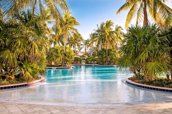 3 outdoor pools, sun loungers at Tranquility Bay Beachfront Hotel and Resort