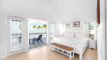 Villa, Multiple Beds, Beachfront | Premium bedding, pillowtop beds, in-room safe, desk at Tranquility Bay Beachfront Hotel and Resort