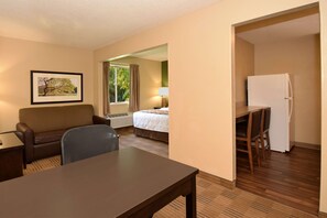 Desk, laptop workspace, blackout curtains, iron/ironing board