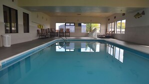 An indoor swimming pool with clear water, a no diving sign, and a 5 ft depth limit. - Comfort Inn & Suites Maumee - Toledo (I80-90) (Maumee)