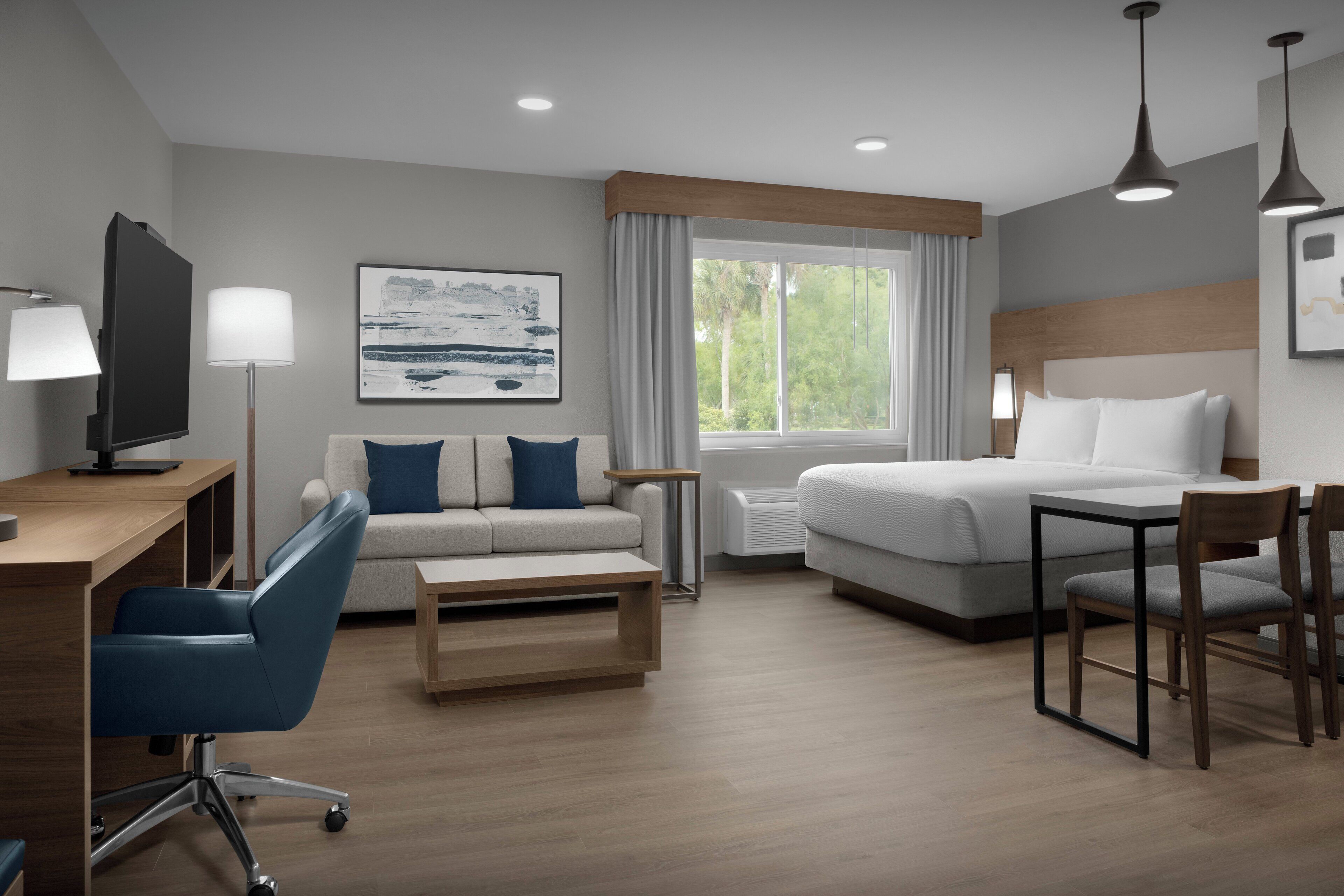 Desk, laptop workspace, blackout curtains, iron/ironing board