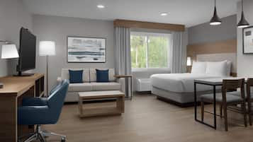 Työpöytä, kannettavalle tietokoneelle sopiva työtila, pimennysverhot