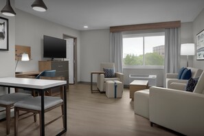 Suite, 1 Bedroom | Desk, laptop workspace, blackout drapes, iron/ironing board
