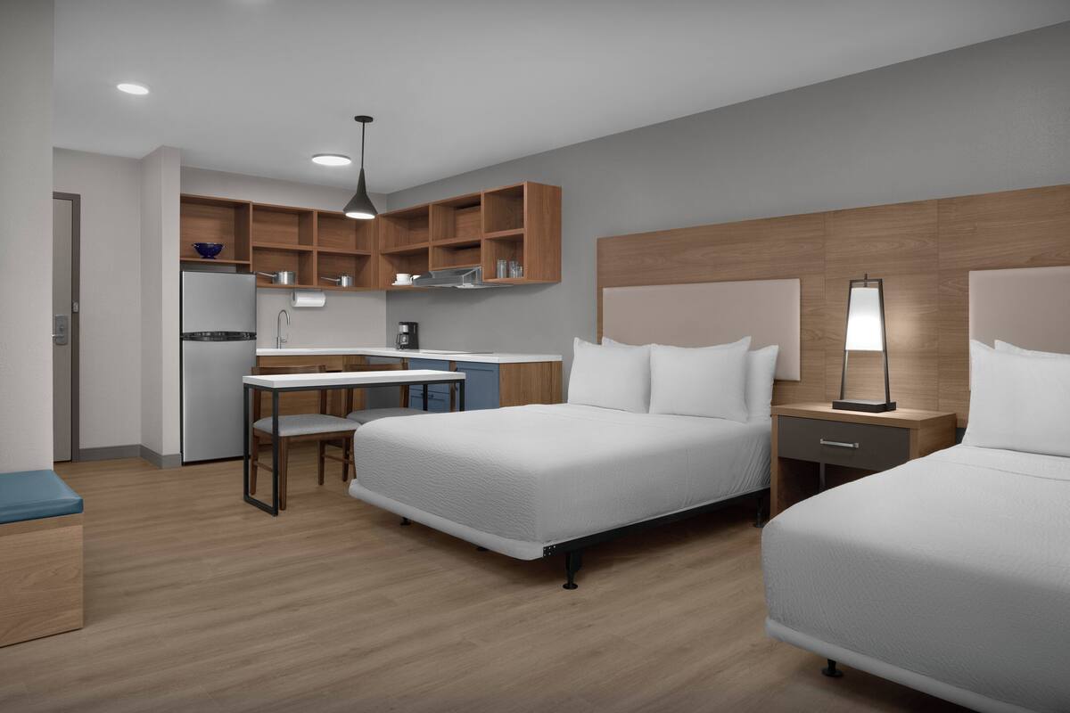 Studio, 2 Queen Beds, Roll-in Shower (Mobility Accessible) | Desk, laptop workspace, blackout drapes, iron/ironing board