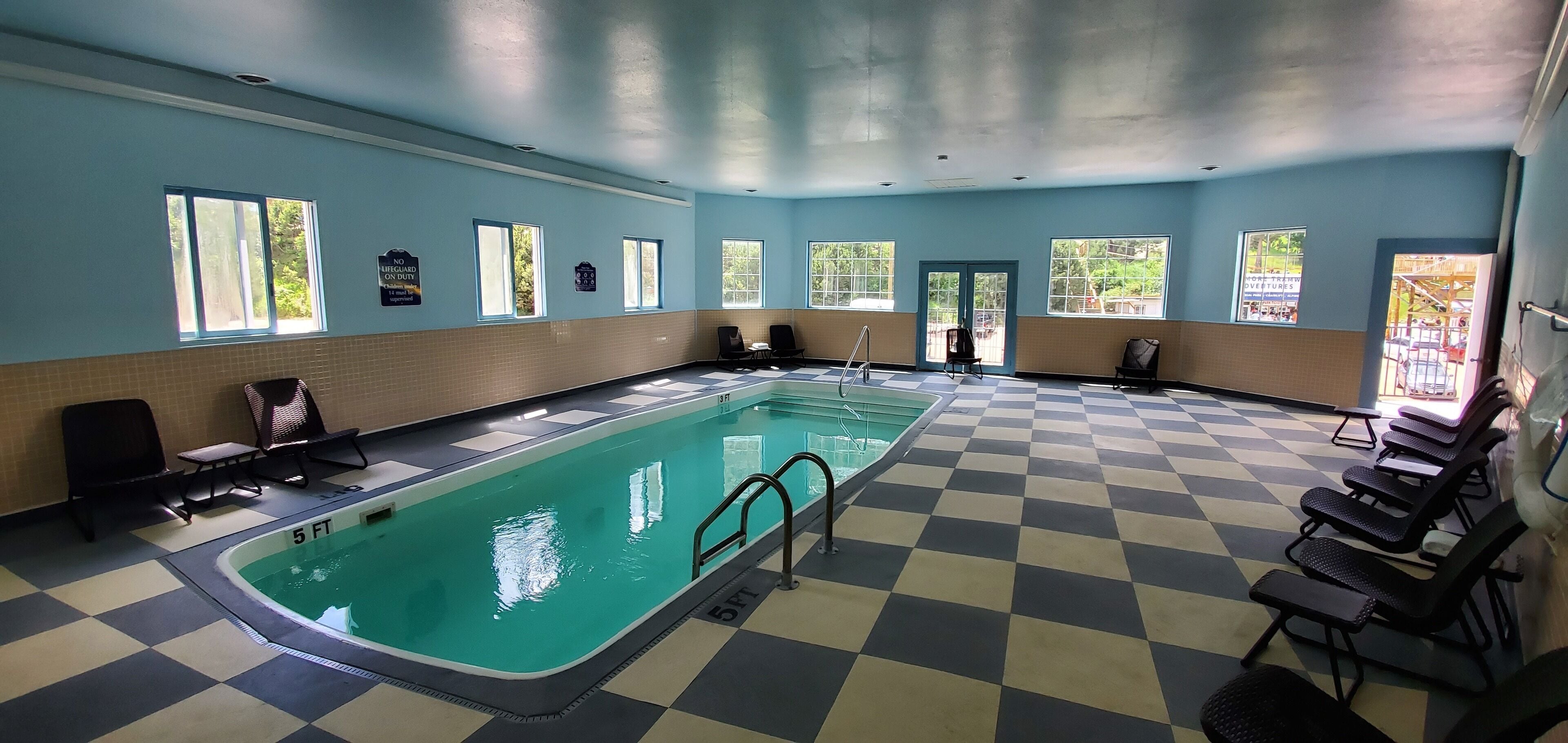 indoor pool, open 10:00 am to 9:00 pm, pool loungers