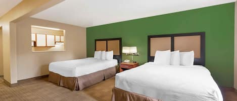 Deluxe Studio, Multiple Beds, Non Smoking | Pillow-top beds, desk, laptop workspace, iron/ironing board