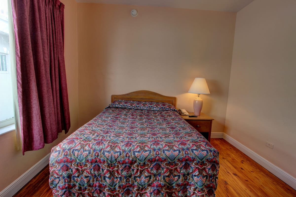 Standard One Bed | Premium bedding, in-room safe, blackout drapes, iron/ironing board