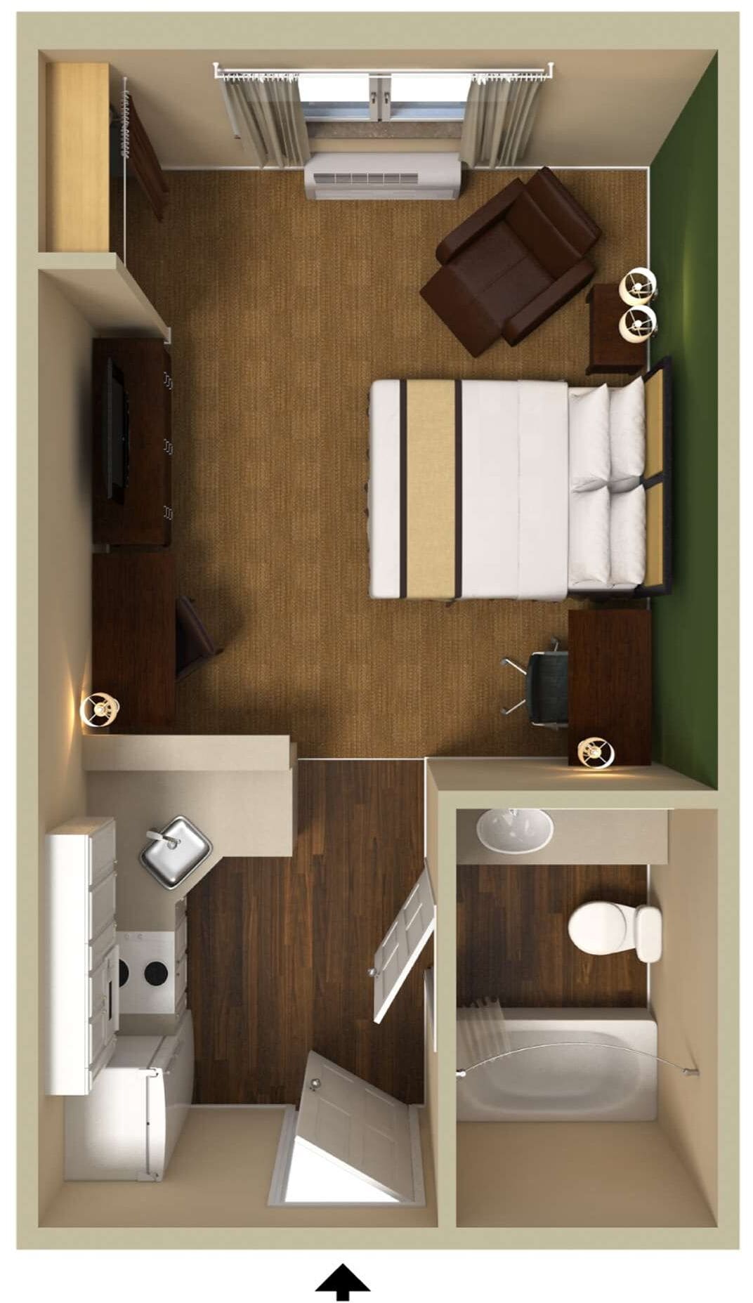 Quarto de hotel compacto com cama, pequena escrivaninha, cadeira, guarda-roupa, banheiro e cozinha compacta.