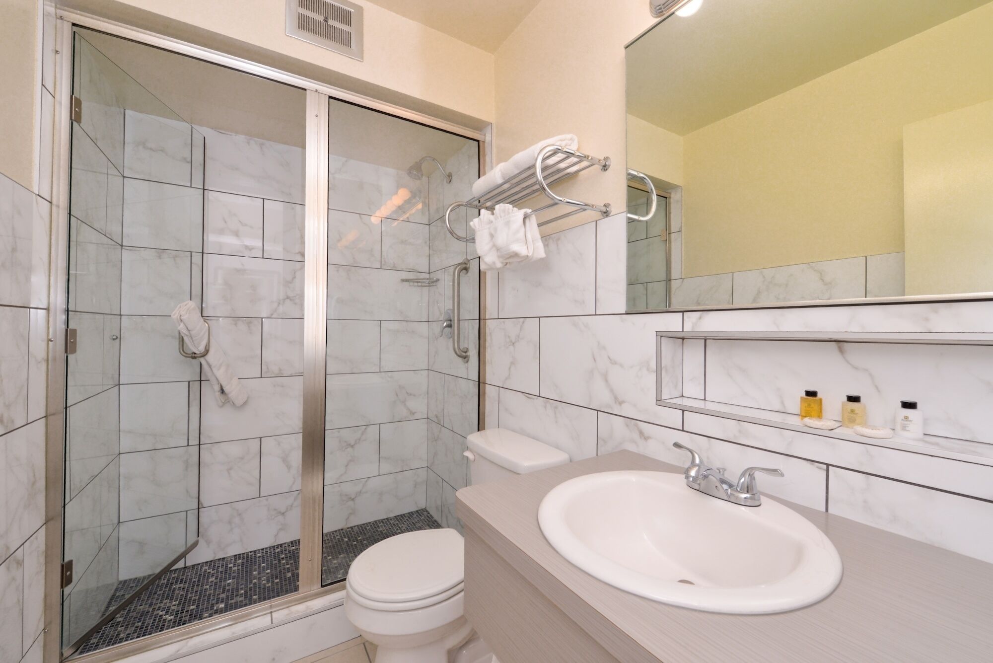 shower, free toiletries, hair dryer, towels