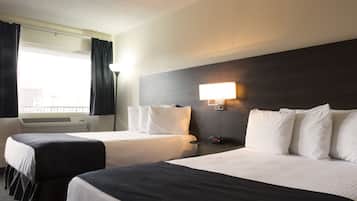 Ropa de cama de alta calidad, camas con pillow-top y escritorio