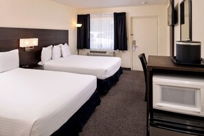 标准双人房 (Queen) | 高档床上用品、加厚床垫、办公桌、笔记本电脑工作区