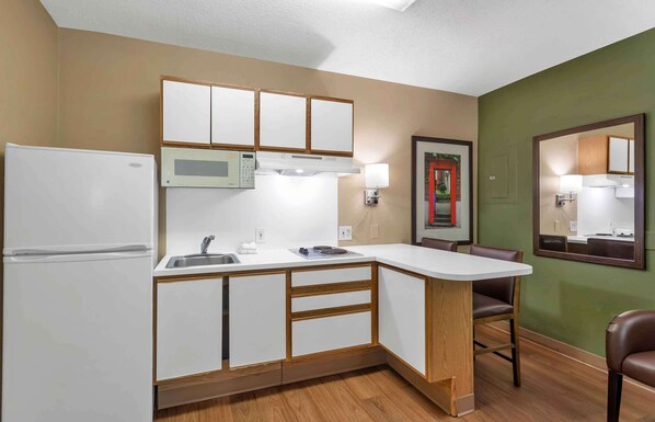 Fridge, microwave, stovetop, coffee/tea maker