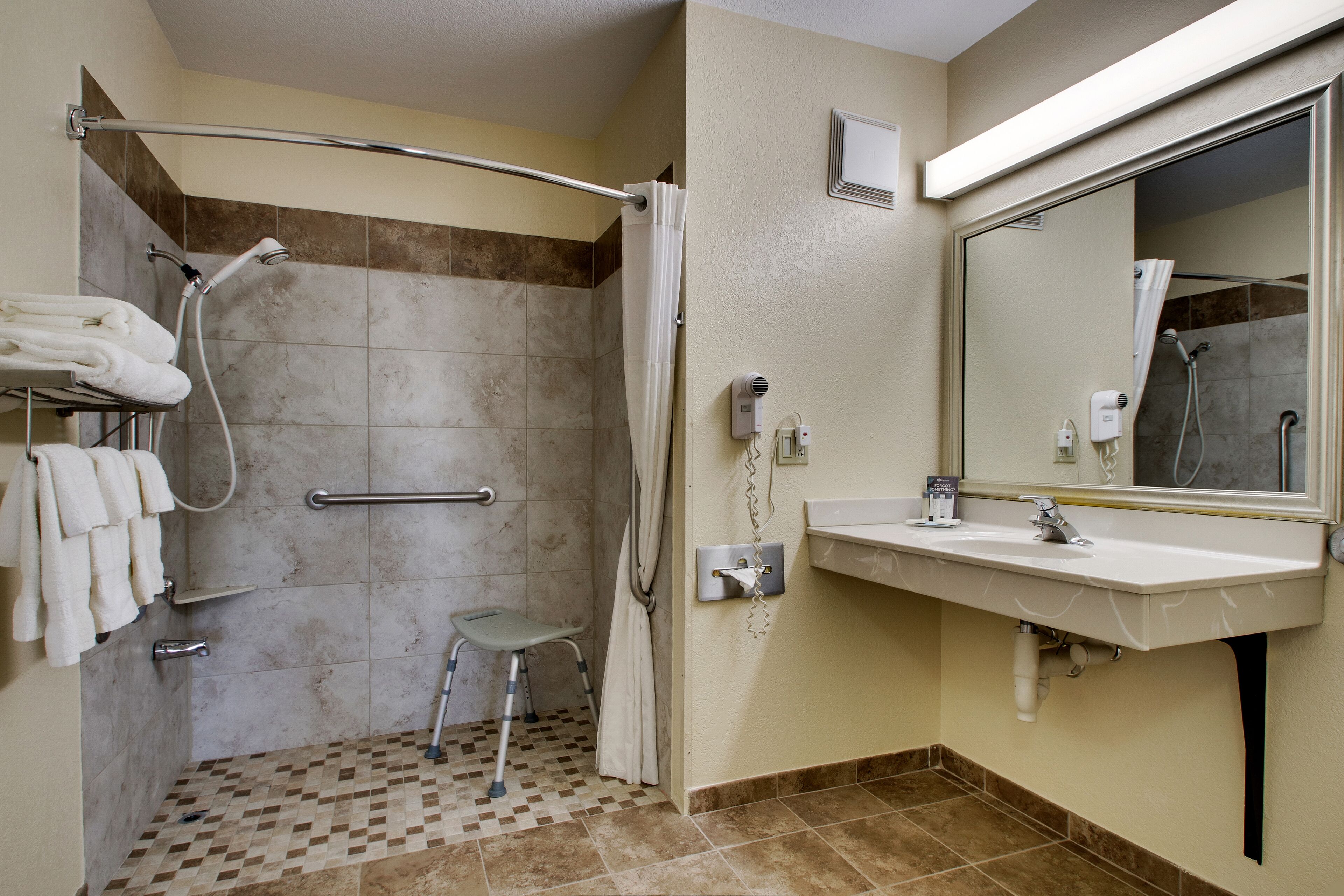 room, 1 queen bed, accessible (handicapped queen) | bathroom | combined shower/bathtub, free toiletries, hair dryer, towels