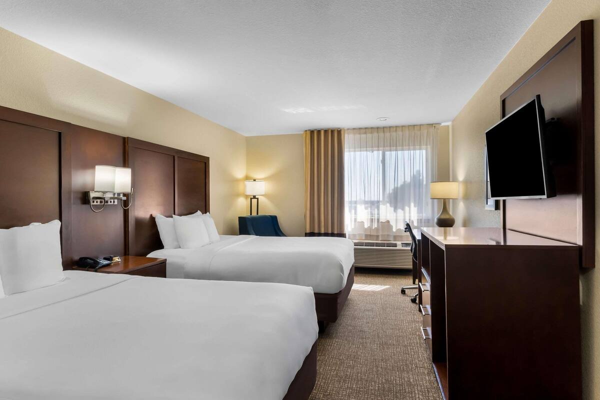 Premium bedding, pillowtop beds, desk, laptop workspace
