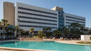Outdoor pool, open 8:00 AM to 10:00 PM, free cabanas, sun loungers