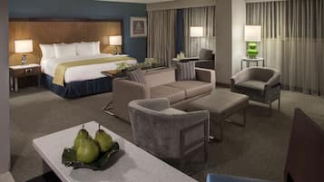 Deluxe Studio Suite, 1 King Bed | Pillowtop beds, in-room safe, desk, blackout drapes