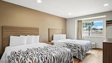 Deluxe Room, 2 Queen Beds, Roll-in Shower, Non Smoking | Desk, blackout drapes, iron/ironing board, free WiFi