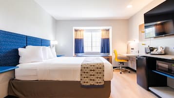 Suite Studio, 1 grand lit, non-fumeurs | Bureau, fer et planche à repasser, lits bébé (gratuits)