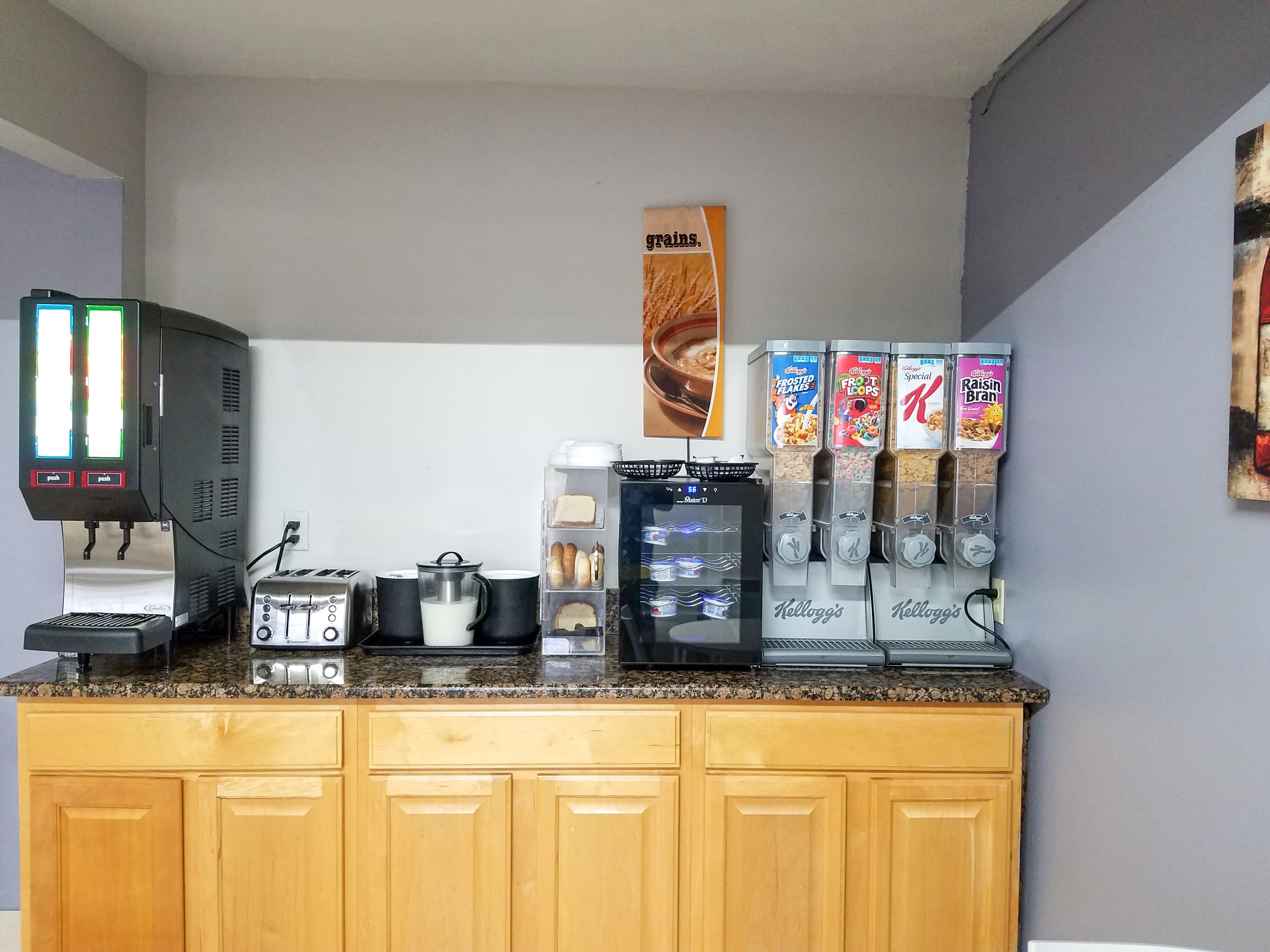 A self-service breakfast station with a coffee machine, a toaster, and cereal dispensers.