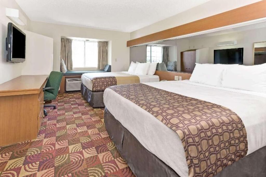 Desk, travel crib, free WiFi, bed sheets