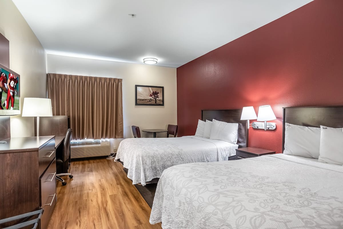 Desk, laptop workspace, blackout curtains, free WiFi